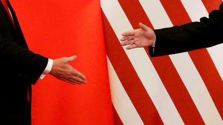 Hand drauf: Ein Handelskrieg zwischen den beiden Großmächten USA und China scheint abgewendet.