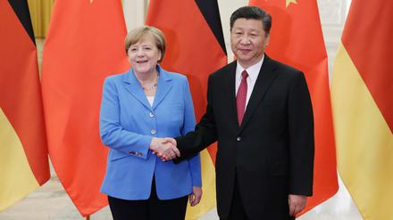 Chinas Staatschef Xi Jinping empfängt Angela Merkel in Peking. 