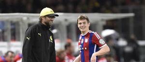 Wiedersehen in neuen Outfits. Zuletzt trafen Jürgen Klopp (links) und Toni Kroos als Gegner im DFB-Pokalfinale 2014 in Berlin aufeinander. Kroos gewann damals mit den Bayern 2:0 gegen Dortmund. 