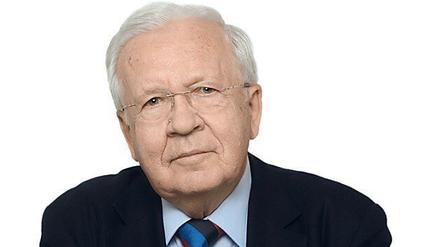 Ein Porträtbild von George Turner. 