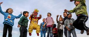 „L“ wie Lachen. Das gefällt Kindern überall auf der Welt.