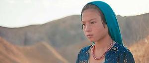 Außenseiter. Die Kinder im Dorf hänseln Qodrat (Qodratollah Qadiri).