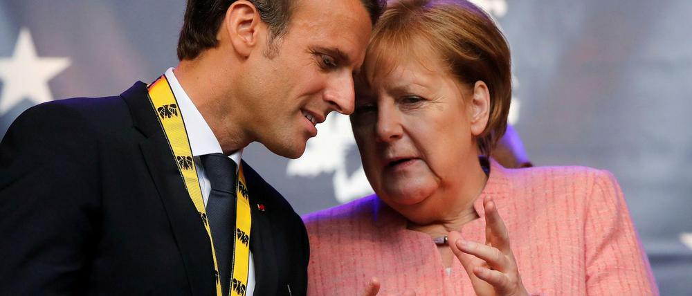 Macron und Merkel nach der Verleihung des Karlspreises an den französischen Präsidenten im Mai.