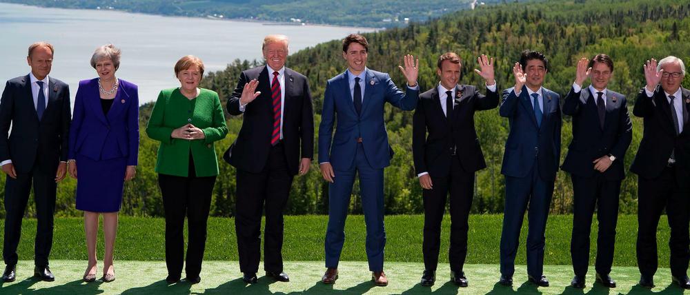En sehr bemühtes Familienfoto der G7-Führer