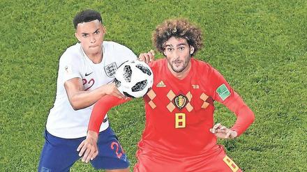 Hatten schon in der Vorrunde das Vergnügen: Trent Alexander-Arnold (l.) und Marouane Fellaini.