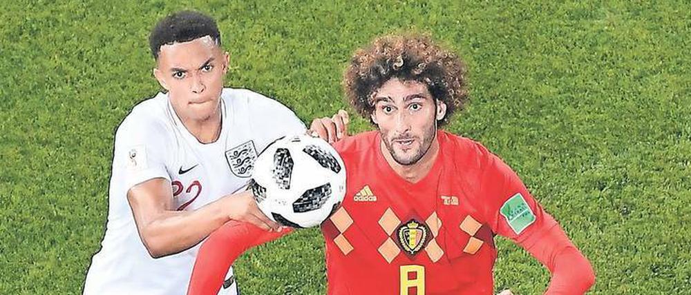Hatten schon in der Vorrunde das Vergnügen: Trent Alexander-Arnold (l.) und Marouane Fellaini.