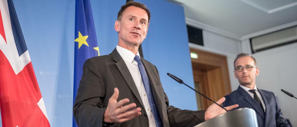 Der neue britische Außenminister Jeremy Hunt (links) neben dem deutschen Außenminister Heiko Maas (SPD).