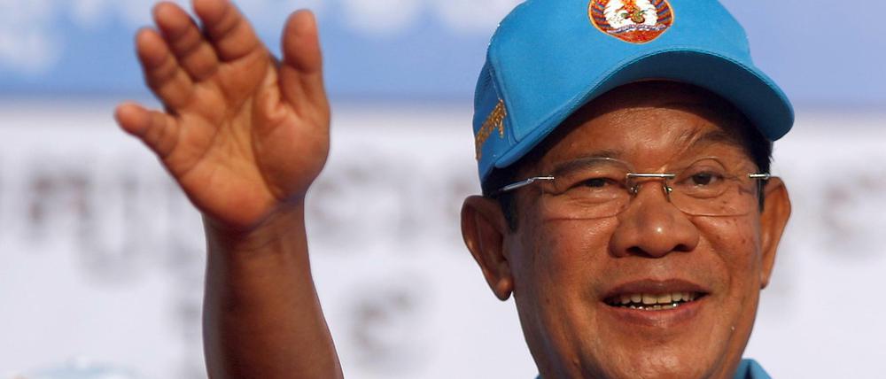 Hun Sen stammt aus einer Landarbeiter-Familie und wurde von Mönchen erzogen.