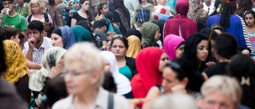 Gemischte Gesellschaft: In Deutschland leben Menschen mit und ohne Migrationshintergrund.