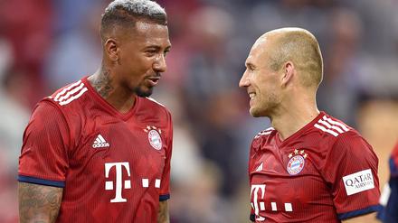 Verstehen sich gut beim FC Bayern München. Jerome Boateng und Arjen Robben.