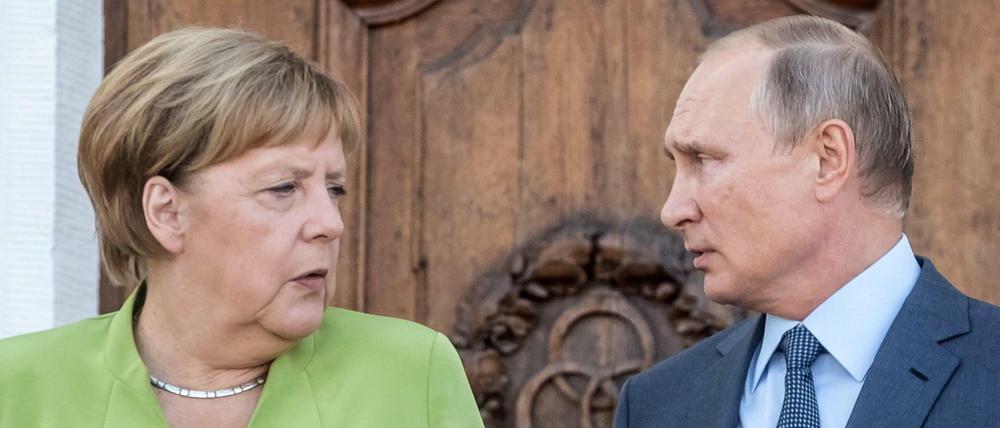 Bundeskanzlerin Angela Merkel und der russische Präsident Wladimir Putin auf Schloss Meseberg.