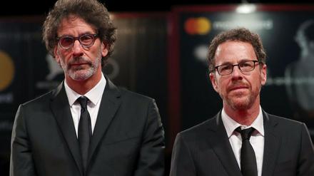 The 75th Venice International Film Festival - ?Screening of the film "The Ballad of Buster Scruggs" competing in the Venezia 75 section - Red Carpet Arrivals - Venice, Italy, August 31, 2018 - Directors Ethan Coen and Joel Coen pose. REUTERS/Tony Gentile