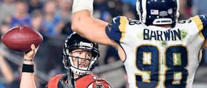 Wurf ins Glück? Die Atlanta Falcons mit Quarterback Matt Ryan (links) gelten in dieser Saison als einer der Titelfavoriten und wollen den Super-Bowl-Heimfluch in der NFL jetzt endlich beenden.