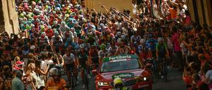 Radrennen wie hier Vuelta a Espana können Städte in einen vorübergehenden Kollaps führen.