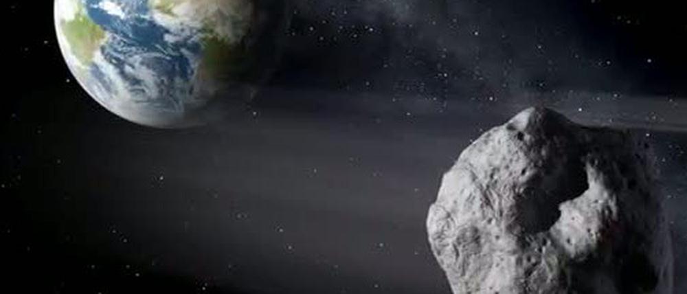 Die künstlerische Darstellung zeigt einen erdnahen Asteroiden im Vorbeiflug. 