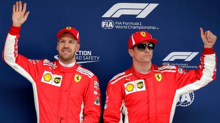 Zwei, die sich gut verstehen. Sebastian Vettel (l.) und Kimi Räikkönen. Letzterer muss seine rote Kappe 2019 abgeben.