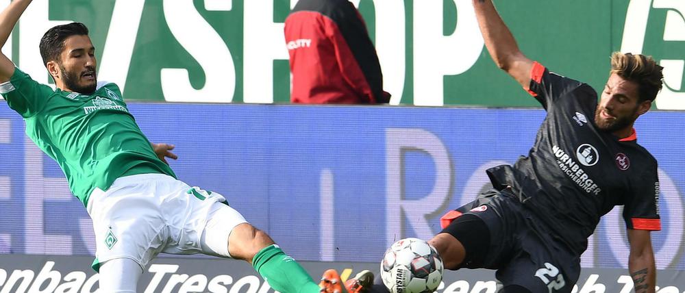 Enges Duell. Werders Nuri Sahin (l.) und Nürnbergs Enrico Valentini.