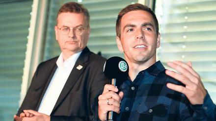 Wer ist hier der Boss? Philipp Lahm (rechts) wird schon als möglicher Nachfolger für DFB-Präsident Reinhard Grindel gehandelt.