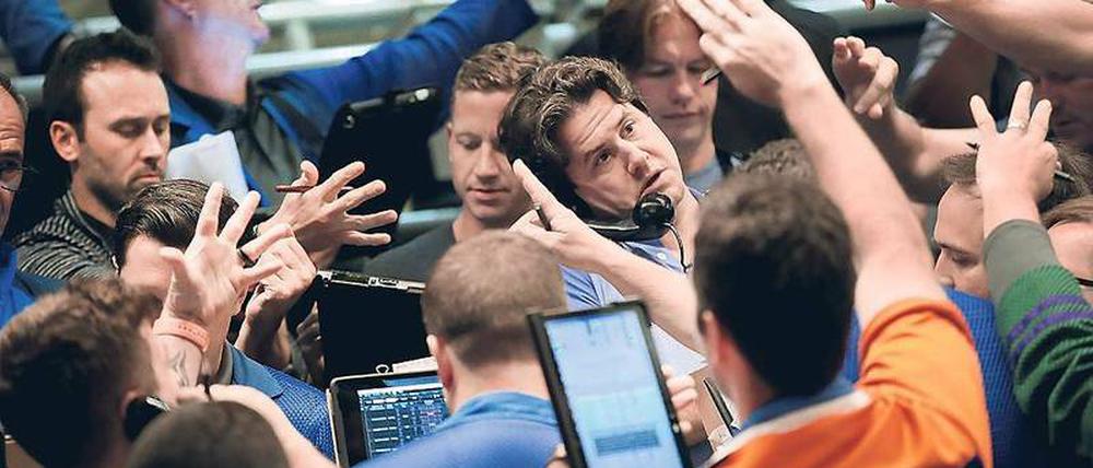 Steigende Zinsen machen Anleger nervös – wie hier an der Börse in Chicago am 26. September. Minuten zuvor hatte die US-Notenbank Fed ihren jüngsten Zinsschritt verkündet. 