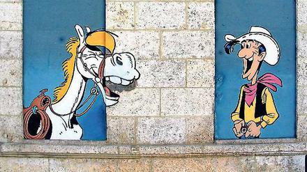 Starkes Team. Lucky Luke und sein Pferd Jolly Jumper, hier auf einem Wandbild in Angoulême. 