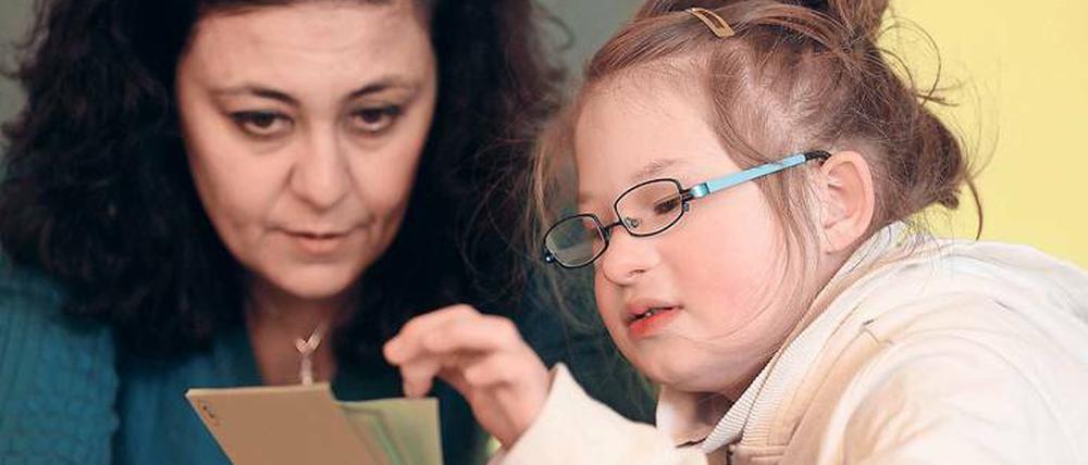 Kinder mit Downsyndrom haben oft eine verzögerte Entwicklung – und sind oft sehr lebensfroh.