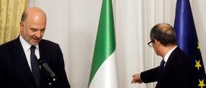 Italiens Wirtschaftsminister Giovanni Tria und EU-Wirtschaftskommissar Pierre Moscovici streiten über Roms Haushaltsentwurf.