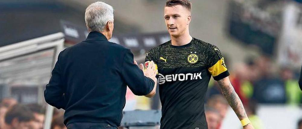 Können gut miteinander. Lucien Favre (l.) trainierte und förderte Marco Reus (r.) schon während seiner Zeit in Mönchengladbach.