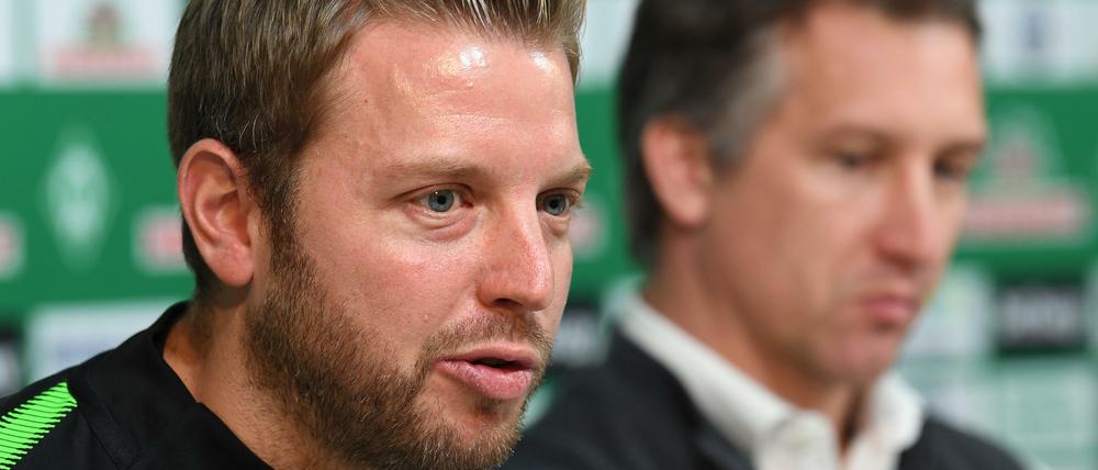 Ein Team. Trainer Florian Kohfeldt mit seinem Chef Frank Baumann.