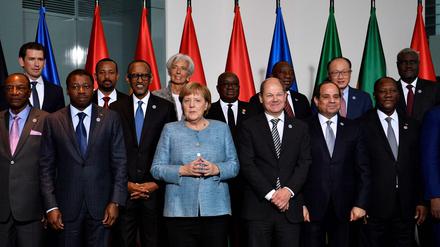 Teilnehmer des "G20 Investment Summit" in Berlin. Foto: John Macdougall / AFP