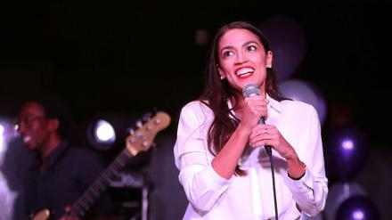 NEW YORK, NY - NOVEMBER 06: Alexandria Ocasio-Cortez addresses the crowd gathered at La Boom night club in Queens on November 6, 2018 in New York City. With her win against Republican Anthony Pappas, Ocasio-Cortez became the youngest woman elected to Congress. Rick Loomis/Getty Images/AFP== FOR NEWSPAPERS, INTERNET, TELCOS &amp; TELEVISION USE ONLY ==