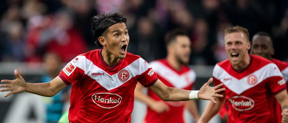Takashi Usami (l.) schoss das 1:0, Rouwen Hennings das 2:0. 