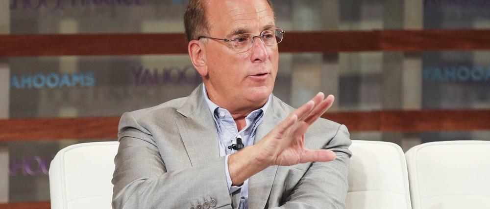Larry Fink will einen "positiven Beitrag" in Deutschland leisten - Zufall, dass die Deutsche Bank damit auch wirbt?