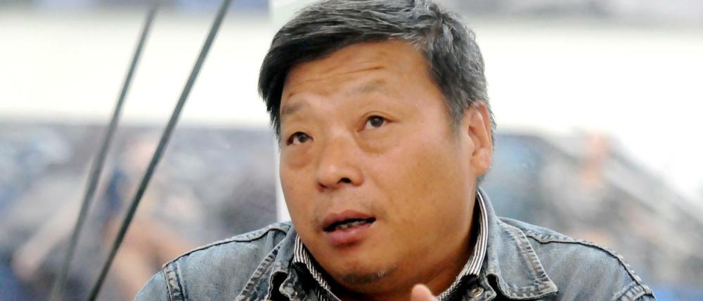 Der chinesische Fotograf Lu Guang.