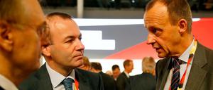 Erklärungsbedarf: Friedrich Merz (r.) hat beim Parteitag auch seine eigenen Anhänger enttäuscht. 