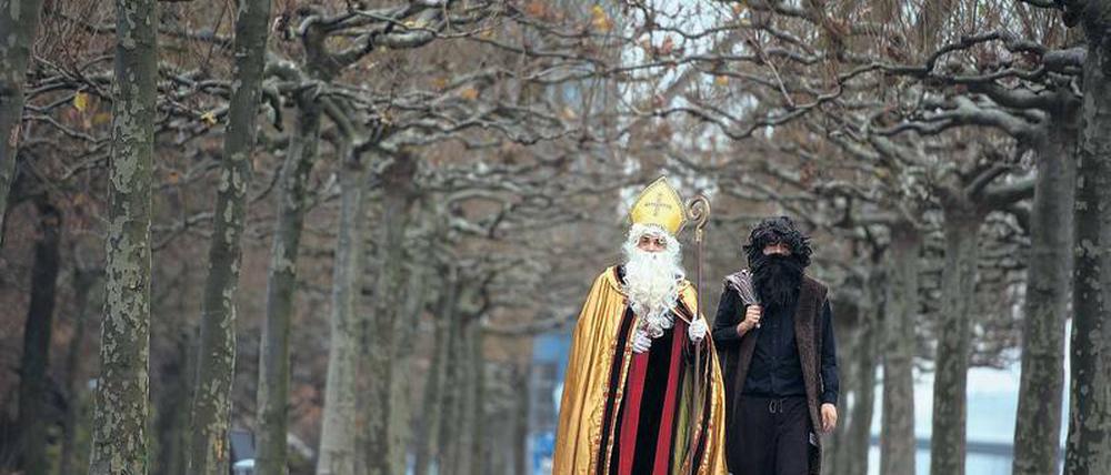 Gegensätzliches Duo. Die Figuren des heiligen Nikolaus und Knecht Ruprecht stammen aus dem Mittelalter. 