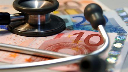 Geld für die Gesundheit: Kassenpatienten sparen im nächsten Jahr.