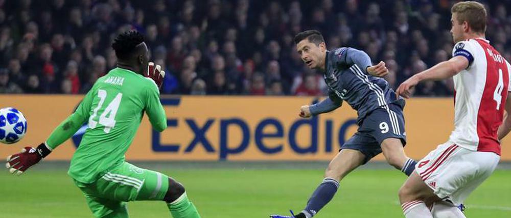 Ausgeguckt. Torjäger Robert Lewandowski trifft formvollendet zum 1:0 für die Münchner.