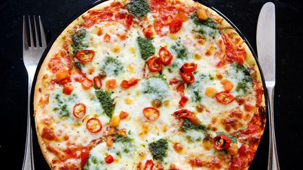 Tiefkühlpizzen sollen bald mit weniger Zucker und Fett auskommen. 