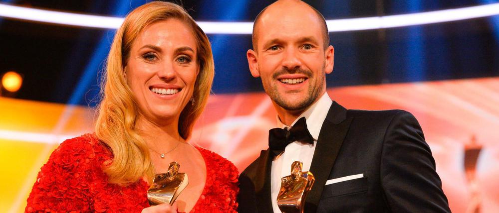 Tennisspielerin Angelique Kerber und Triathlet Patrick Lange bei der Ehrung am Sonntag in Baden-Baden.