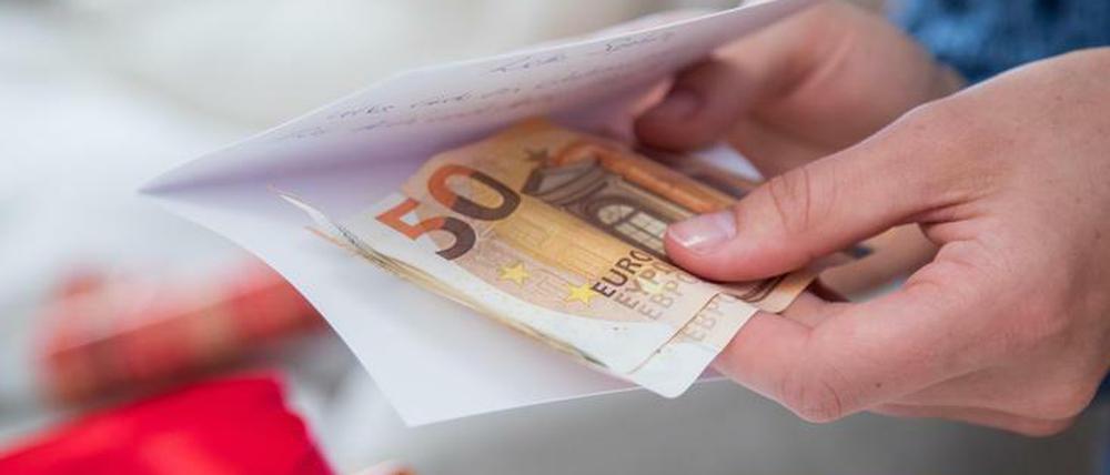 Zwar beliebt, aber wenig kreativ: Geld in einer Geschenkkarte