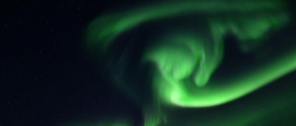 Ein tanzendes Nordlicht über Island.