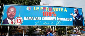 Wahlwerbung zeigt die Unterstützung durch den kongolesischen Präsident Joseph Kabila für den Kandidaten Emmanuel Ramazani Shadary.