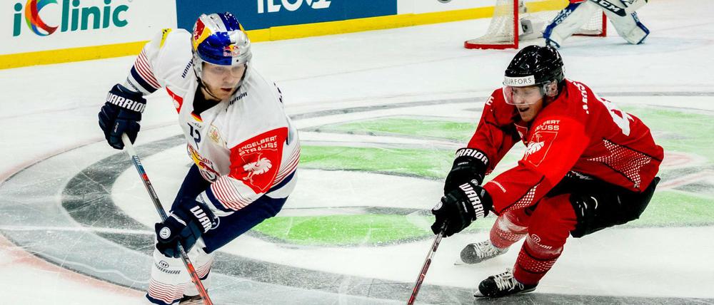 Joel Mustonen (r) von Göteborg und Mads Christensen von München in Aktion.