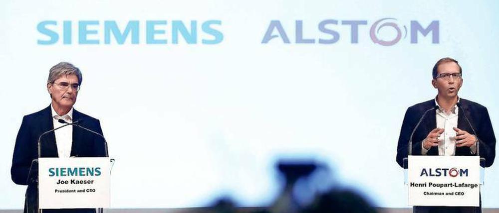 Im September 2017 stellten Siemens-Vorstandschef Joe Kaeser (li.) und sein Alstom-Kollege Henri Poupart-Lafarge in Paris die geplante Fusion vor. Beide Unternehmen müssen sich nun Alternativen suchen. Bei Siemens ist ein Börsengang der Schienenfahrzeugsparte möglich oder vielleicht doch noch eine Kooperation mit Bombardier.