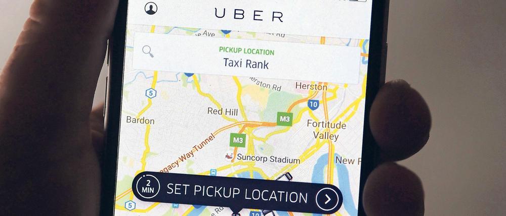 Die App des US-Techkonzerns Uber auf einem Smartphone.