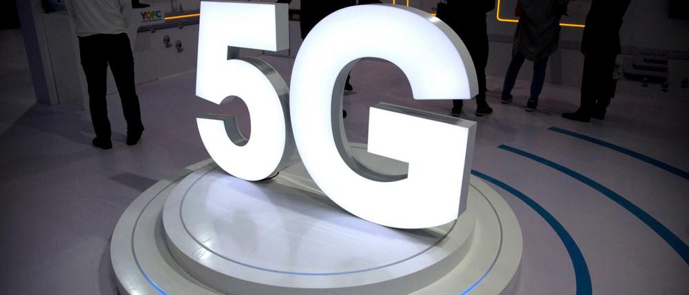 Ein 5G-Logo bei einer Messe in Peking. In Reaktion auf Chinas Machtstreben will die EU-Kommission die europäischen Interessen stärken.