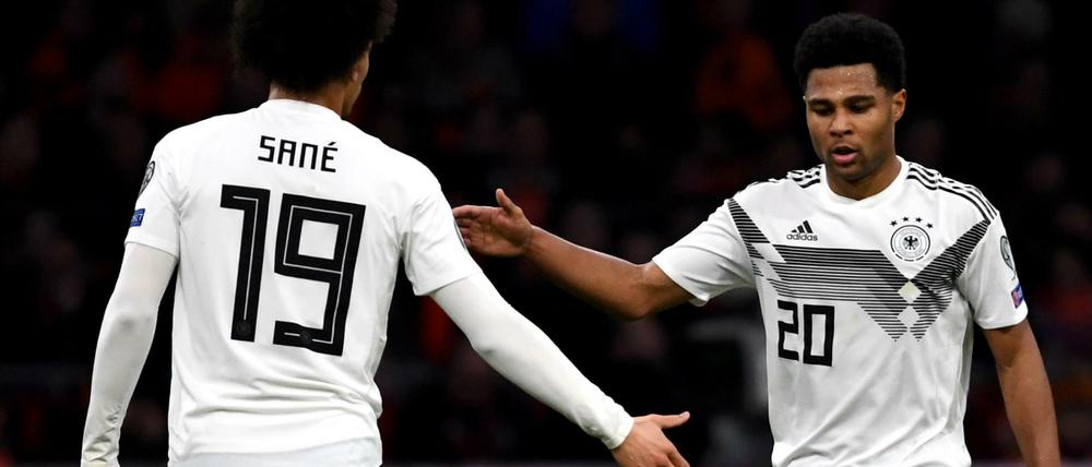 Sinnbilder des Sieges: Leroy Sané und Serge Gnabry.
