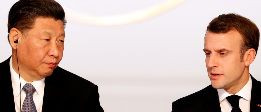 Frankreichs Präsident Emmanuel Macron mit Chinas Staatschef Xi Jinping.
