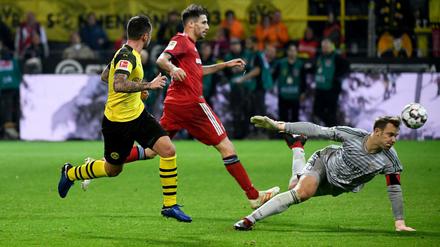 Trotz Neuer. Paco Alcácer (l.) trifft für Dortmund im Hinspiel.
