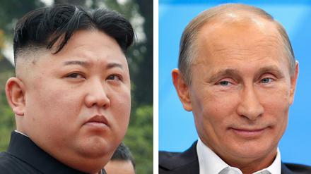 Die Bildkombo zeigt Kim Jong Un, Machthaber von Nordkorea, aufgenommen in Hanoi, und den russischen Ministerpräsident Wladimir Putin (r), aufgenommen in Moskau. 